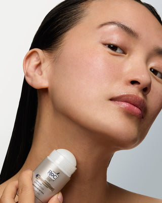 Model applying the firming serum stick