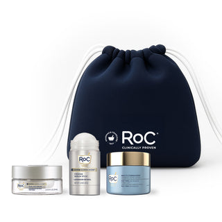 RoC skincare products (Derm Correxion Dual Eye Cream, Derm Correxion Firming Serum Stick, Firm + Lift Anti-sagging cream) with a navy holiday cosmetic bag on a white background