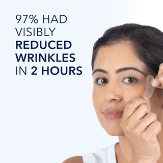 Image showing model applying RETINOL CORREXION® Deep Wrinkle Targeted Patches - 97% had visibly reduced wrinkles in 2 hours