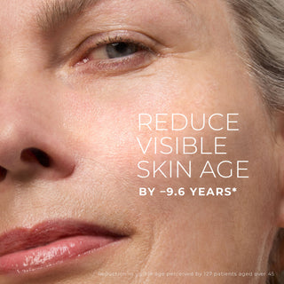 Close-up of a woman's face with text claiming to reduce visible skin age by 9.6 years.
