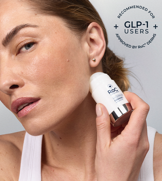 A close-up of a woman applying a white Roc Dermes GLP-1 skin patch to her jawline, with a text overlay in the top right stating 'RECOMMENDED FOR + GLP-1 USERS APPROVED BY ROC DERMS'.