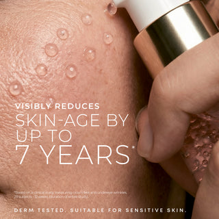 Skincare product being applied to skin with text
"Visibly reduces skin-age by up to 7 years*
*based on a clinical study measuring crow's feet and undereye wrinkles. 
*29 subjects - 12 weeks (duration of entire study). 
Derm tested. Suitable for sensitive skin."