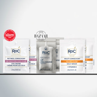 Collection of award winning RoC skincare products including lip volumizer with harpers bazaar seal, line smoothing eye cream with allure seal, and revive + glow daily serum.