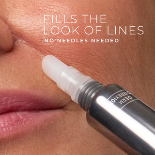 Cosmetic pen being applied to lips with text 'Fills the look of lines, no needles needed' on skin.