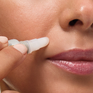 model applying fill + treat serum