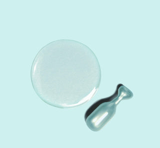 Image of MULTI CORREXION® Hydrate + Plump Serum Capsule and swatch to show consistency of serum